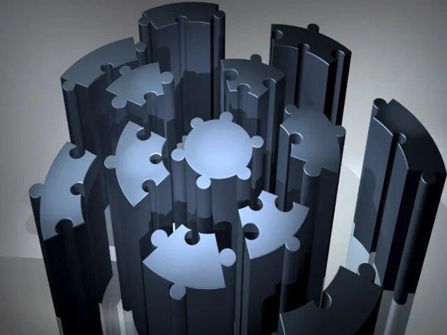 Dreidimensionale Darstellung ineinandergreifender Puzzle-Säulen